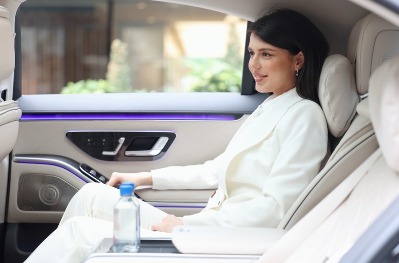 Passenger in the rear cabin of a Limotak vehicle